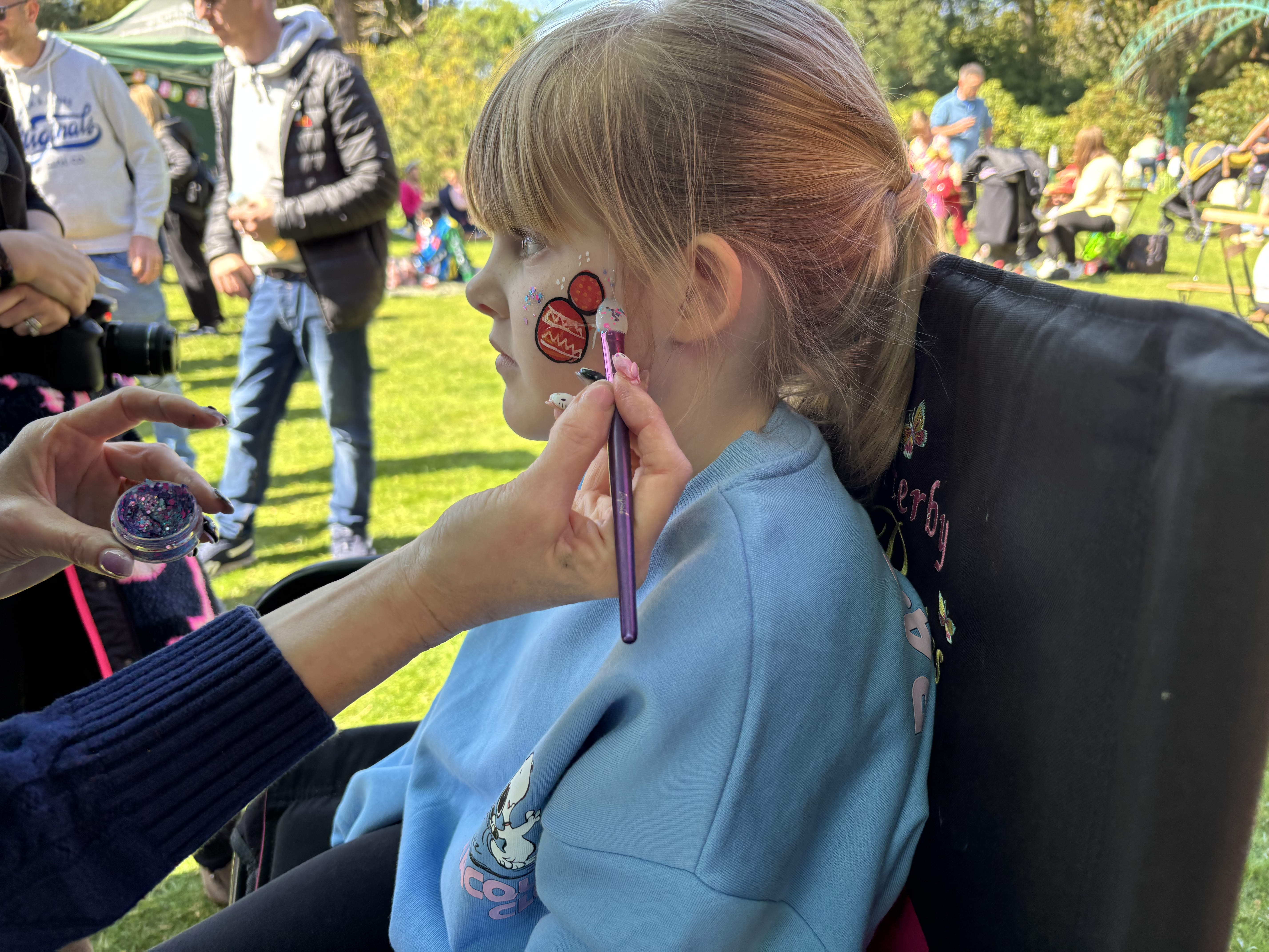 Child Having Her Face Painted. Easter Bunny Flies In 2025. © The Shuttleworth Trust. Photo Hannah Hopkinson