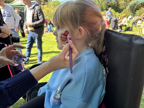 Child Having Her Face Painted. Easter Bunny Flies In 2025. © The Shuttleworth Trust. Photo Hannah Hopkinson