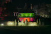 Swiss Cottage Lit Up In Swiss Garden. Shuttleworth In Lights 2025. © The Shuttleworth Trust. Photo Mach 3 Studio.