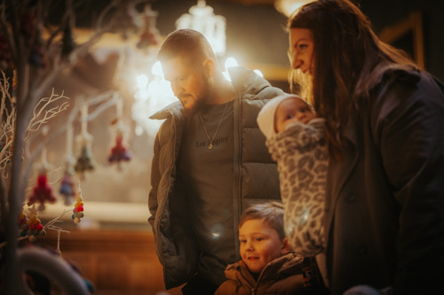 Family At The Christmas Market. © The Shuttleworth Trust. Photo Oliver Lloyd