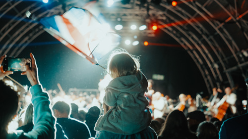 Child On Shoulders. Flying Proms 2024 © The Shuttleworth Trust. Photo Oliver Lloyd