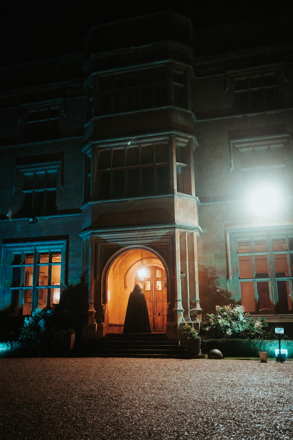 Hooded Visitor At The Gothic Manor
