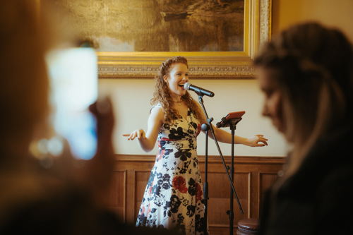 Singer At The Christmas Market. © The Shuttleworth Trust. Photo Oliver Lloyd