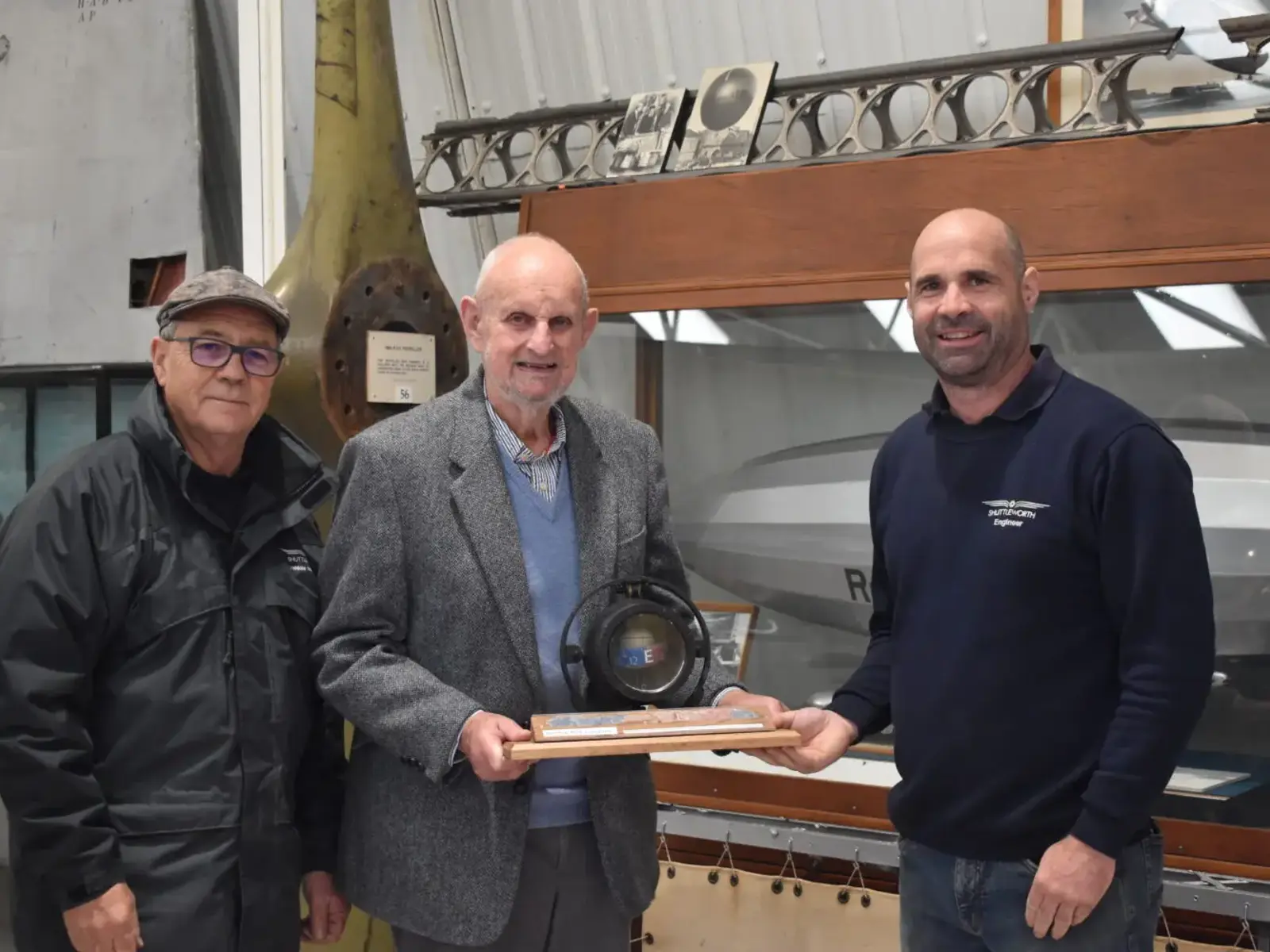 Robert Hattersley Presents The R38 Navigational Compass To Jean Munn And Stuart Gray © The Shuttleworth Trust. Photo Dan Mason.Jpg