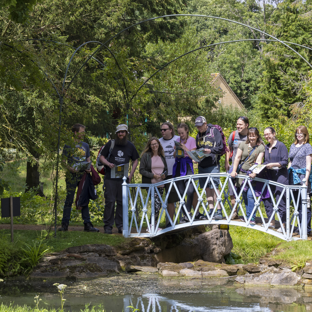 Group On The Bridge In Swiss Garden. © The Shuttleworth Trust. Photo Darren Harbar