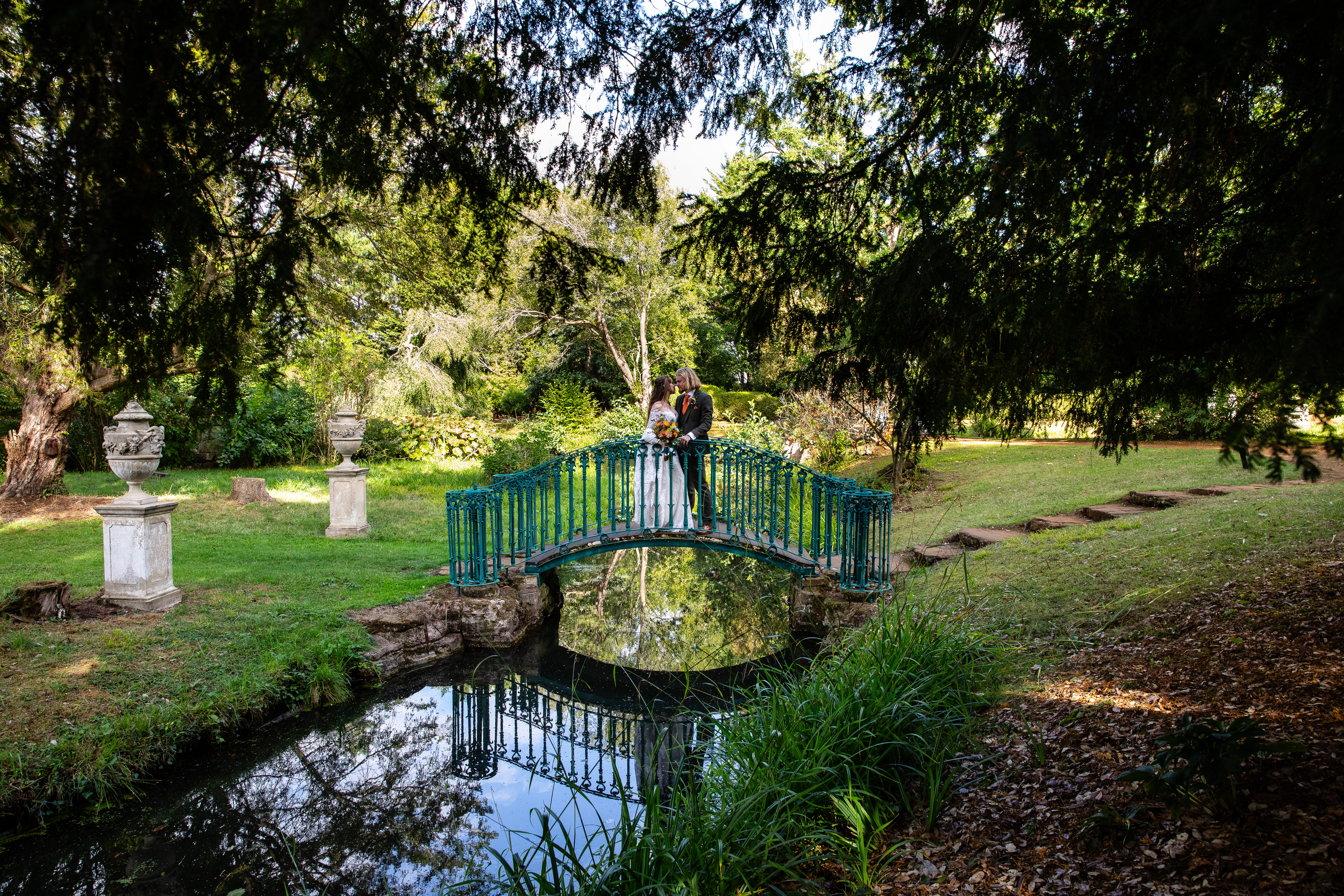 A Couple On A Bridge In Swiss Garden. © The Shuttleworth Trust. Photo Lorna Newman