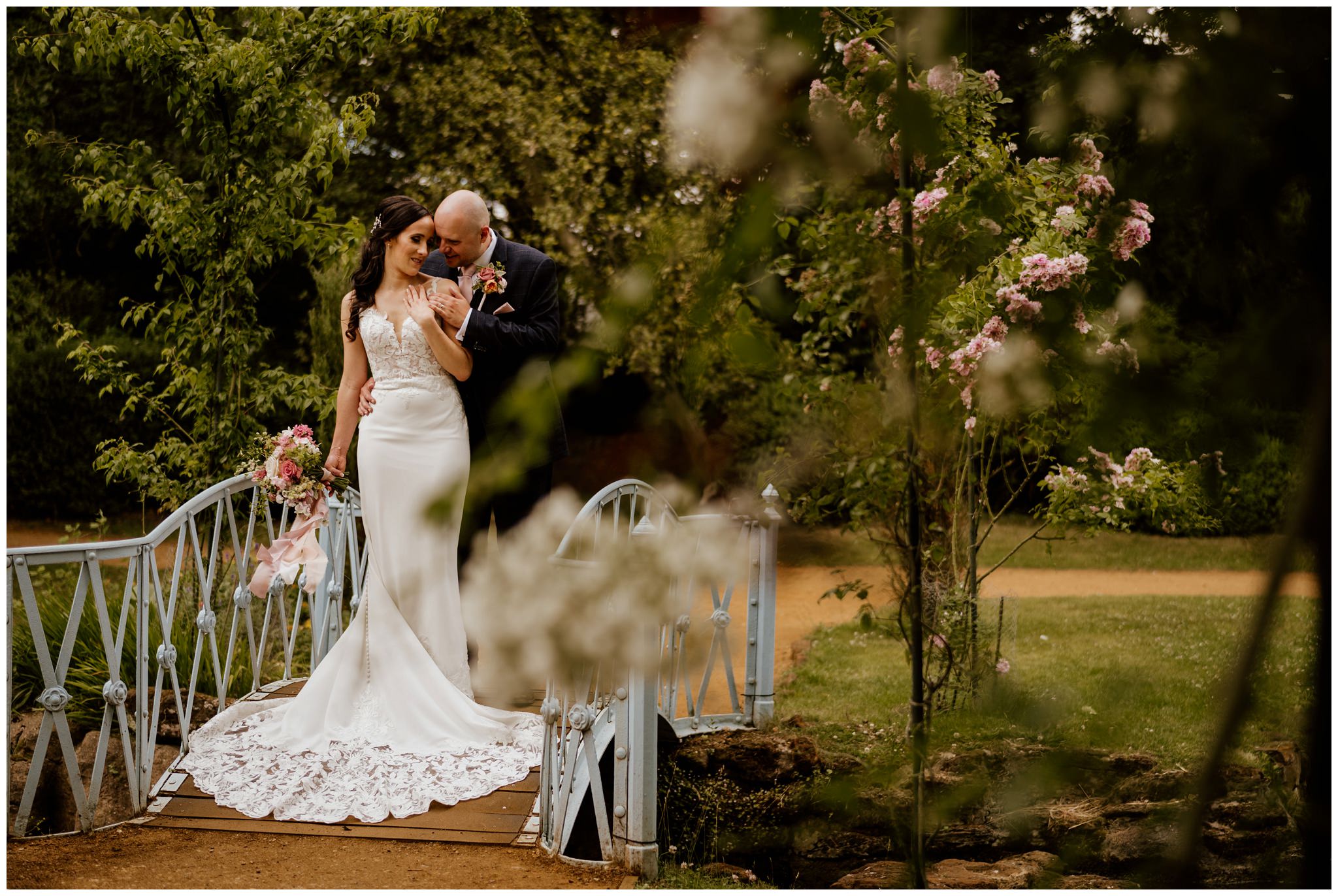 Couple On The Bridge In Swiss Garden. © The Shuttleworth Trust.