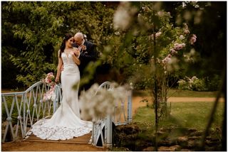 Couple On The Bridge In Swiss Garden. © The Shuttleworth Trust.